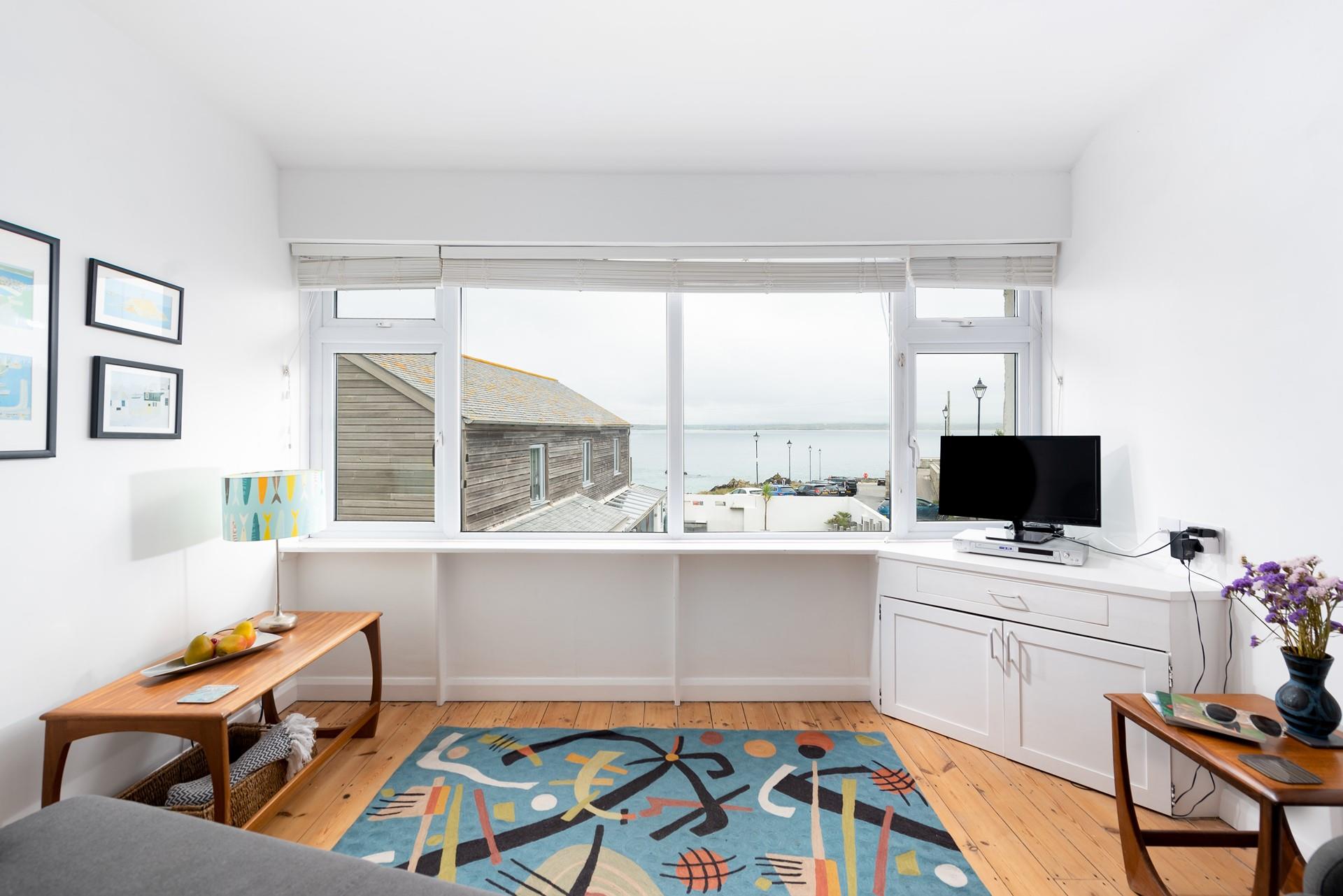 Gaze out at the sea views from the comfort of your sitting room.