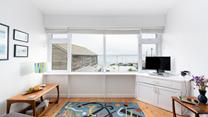 Gaze out at the sea views from the comfort of your sitting room.