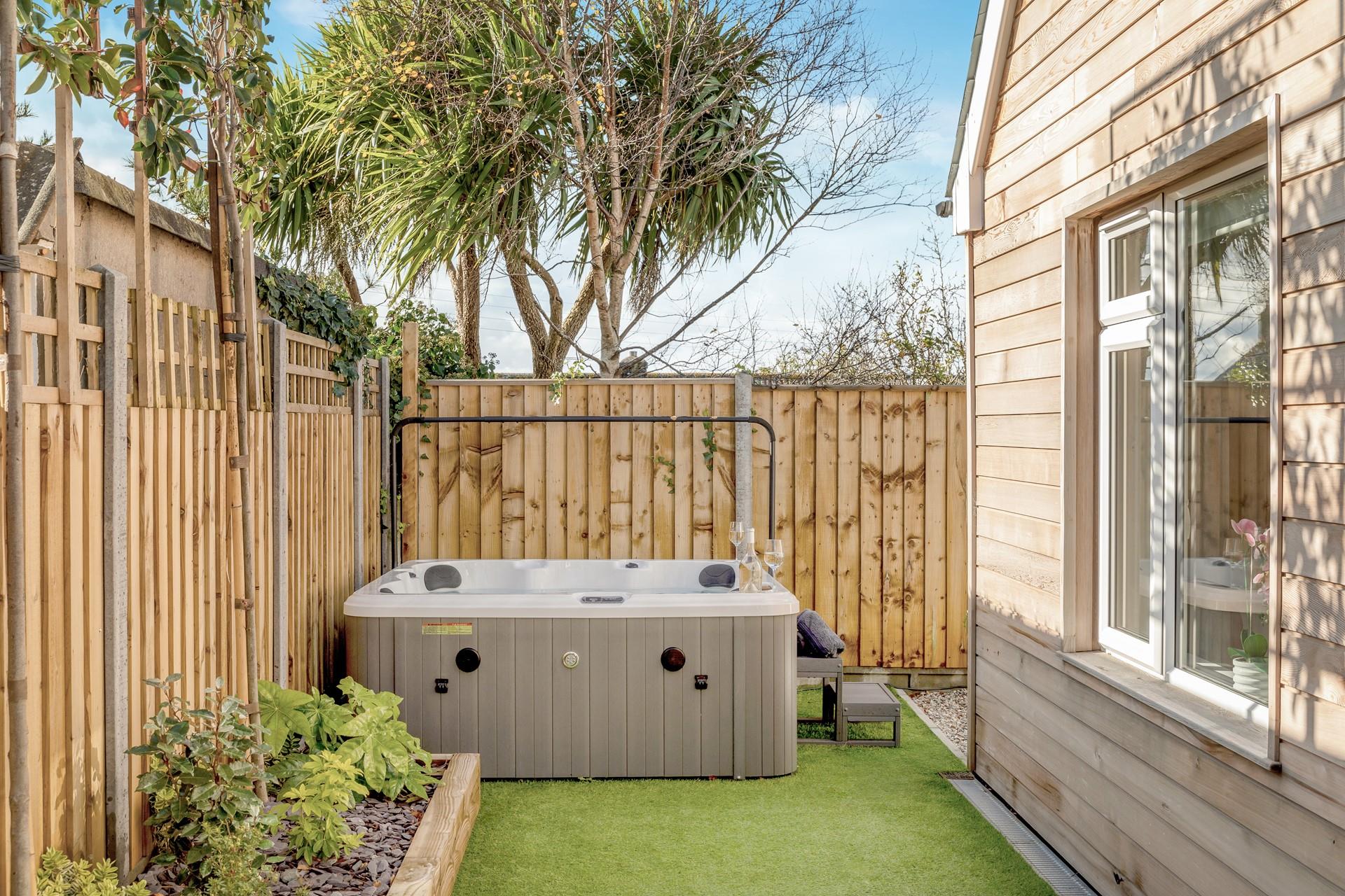 Relax in the hot tub and enjoy a glass of your favourite tipple for ultimate indulgence.