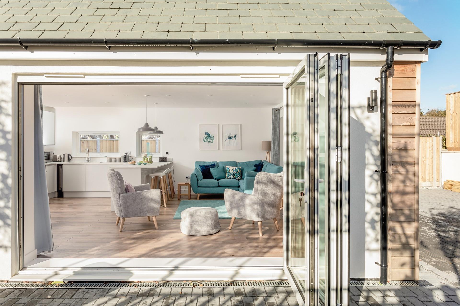 Open the bifold doors to let the fresh breeze run through on a warm day.