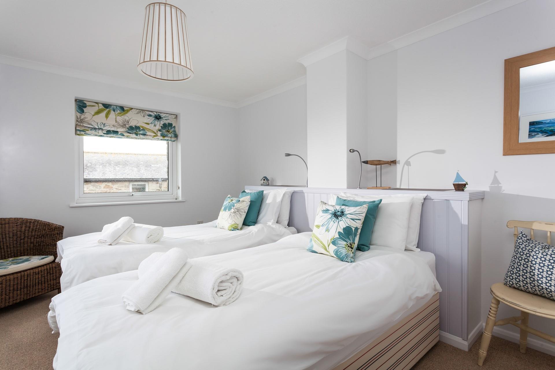 Bedroom 1 has zip and link twin or king size beds which allow for flexible sleeping arrangements.