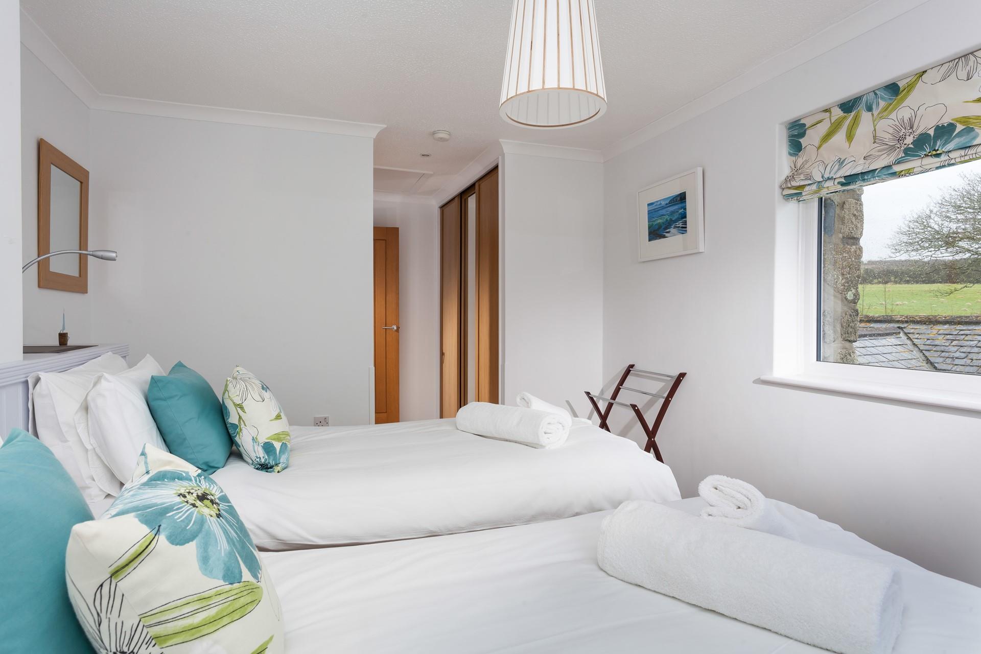 Wake up to sea glimpses from the bedroom window whilst you sip your morning cuppa.