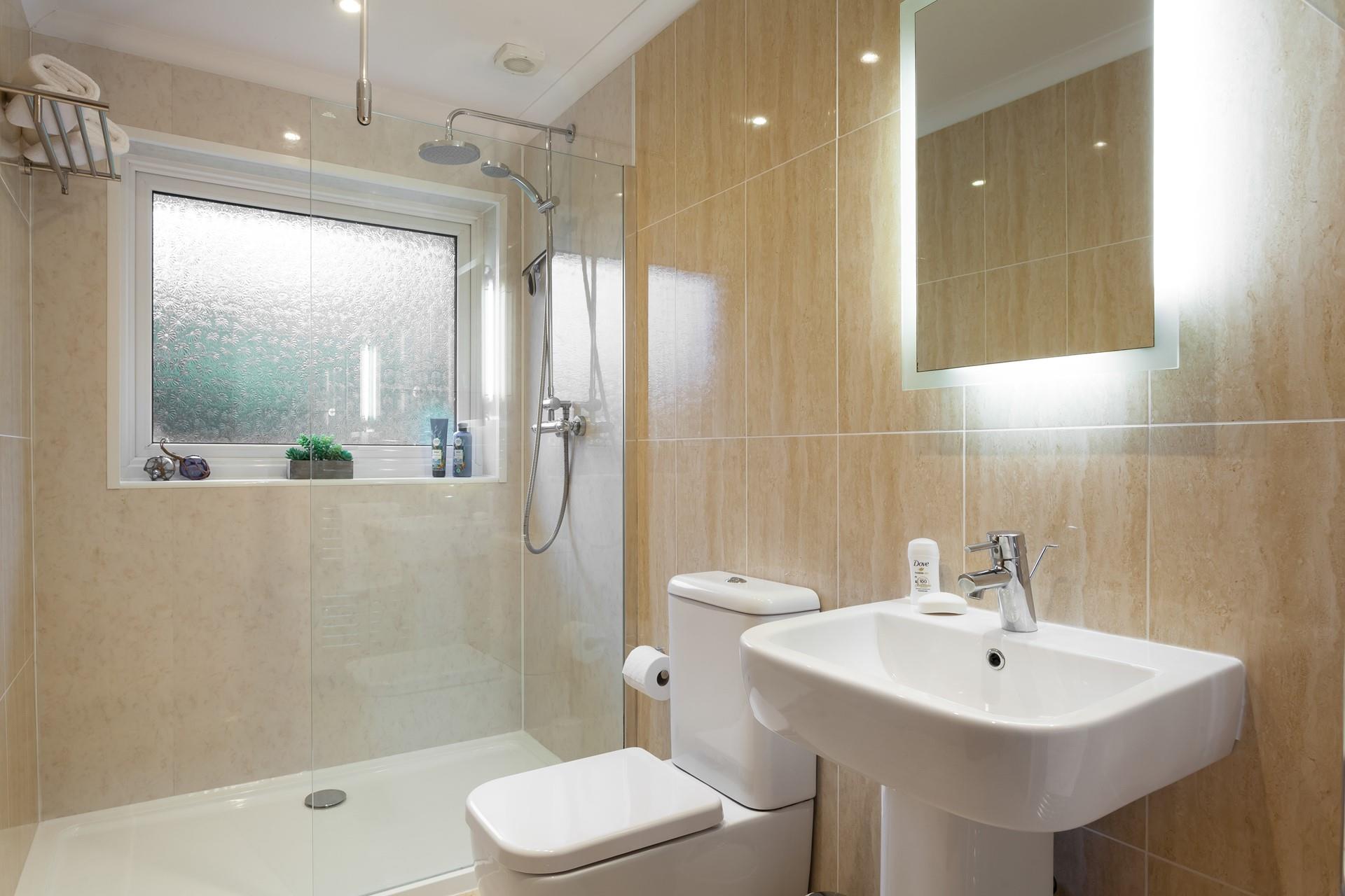 Wash off your sandy toes and salty sea hair in the shower after a day on the soft sands of Perranuthnoe beach.