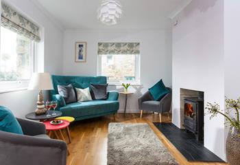 The stylish sitting room provides a haven for relaxation in the evenings.