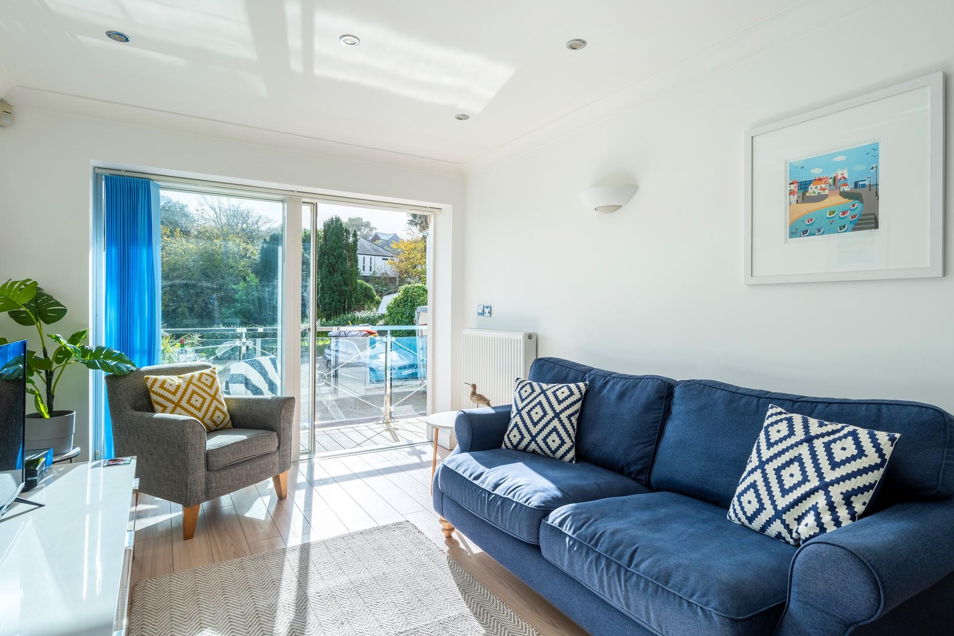 Open the balcony door and let the morning sun fill your living area.