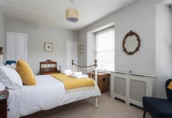 Bedroom 1 offers you a cosy night's sleep after busy days spent exploring.
