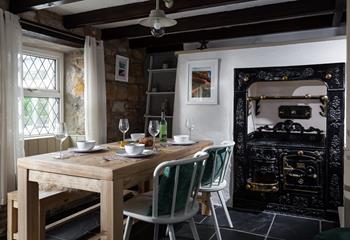 Sit around the table and wait for your delicious roast to be cooked in the traditional Rayburn.