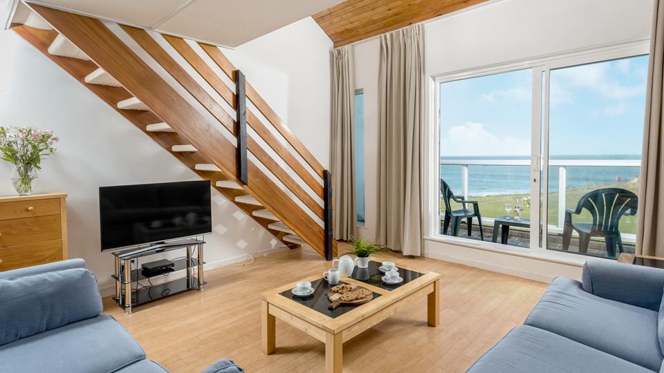 Sink into your sofa and wave watch with your very own sea views across Porthmeor beach.