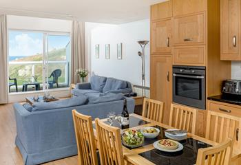The open plan living/dinning area is a great space for entertaining and to enjoy fresh Cornish produce.