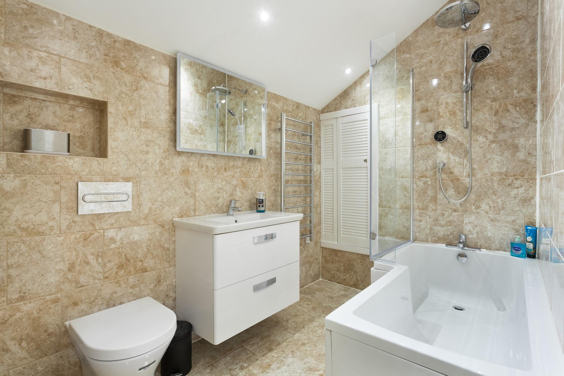 Wash off your sandy toes in the handy shower, or run your self a relaxing bubble bath.