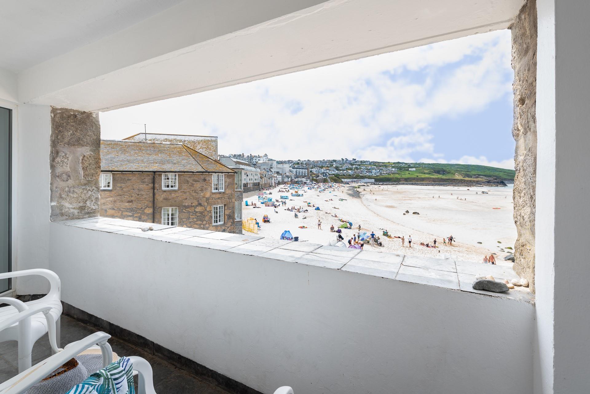 Wander down to the beach while it's quiet for an early morning dip.