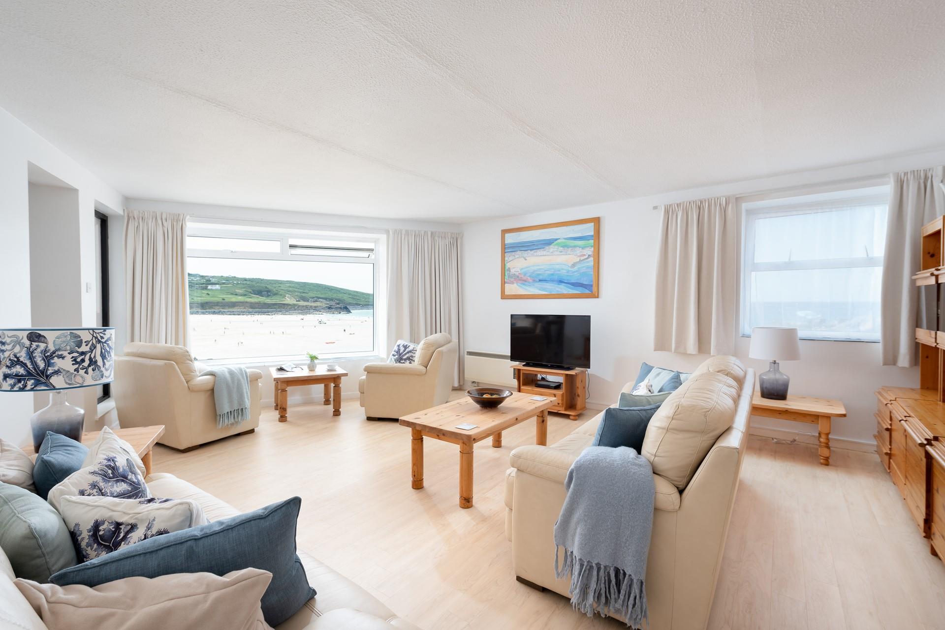 The sitting room is light and spacious and perfect for spending the evening together as a family.