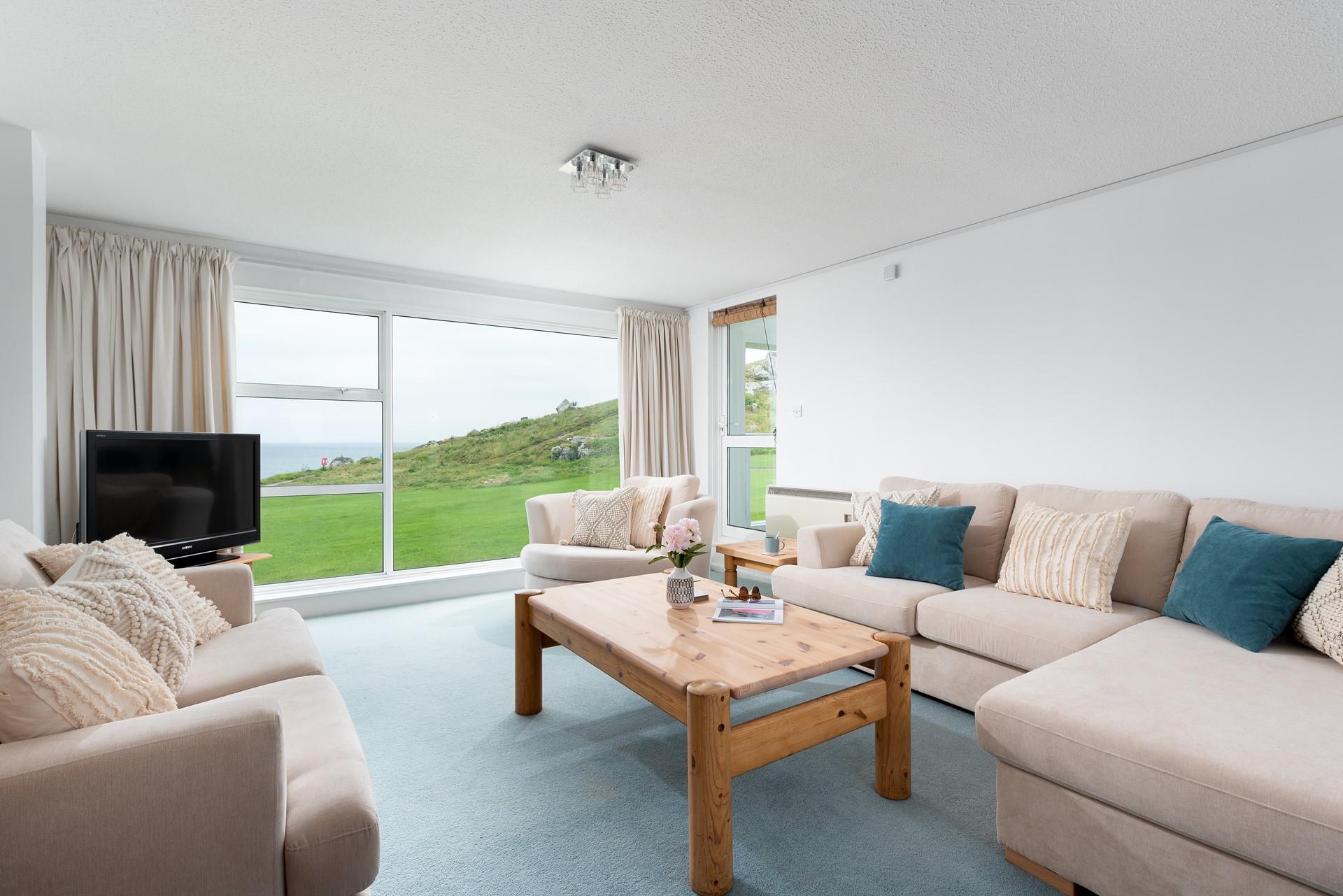 The sitting room has a lovely homely feel for evenings spent relaxing.