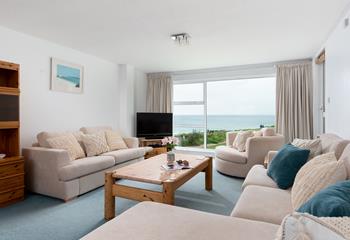 The spacious sitting room offers guests a place to relax after a day on Porthmeor beach.