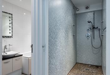 Choose between a bath or an invigorating shower to start the day.