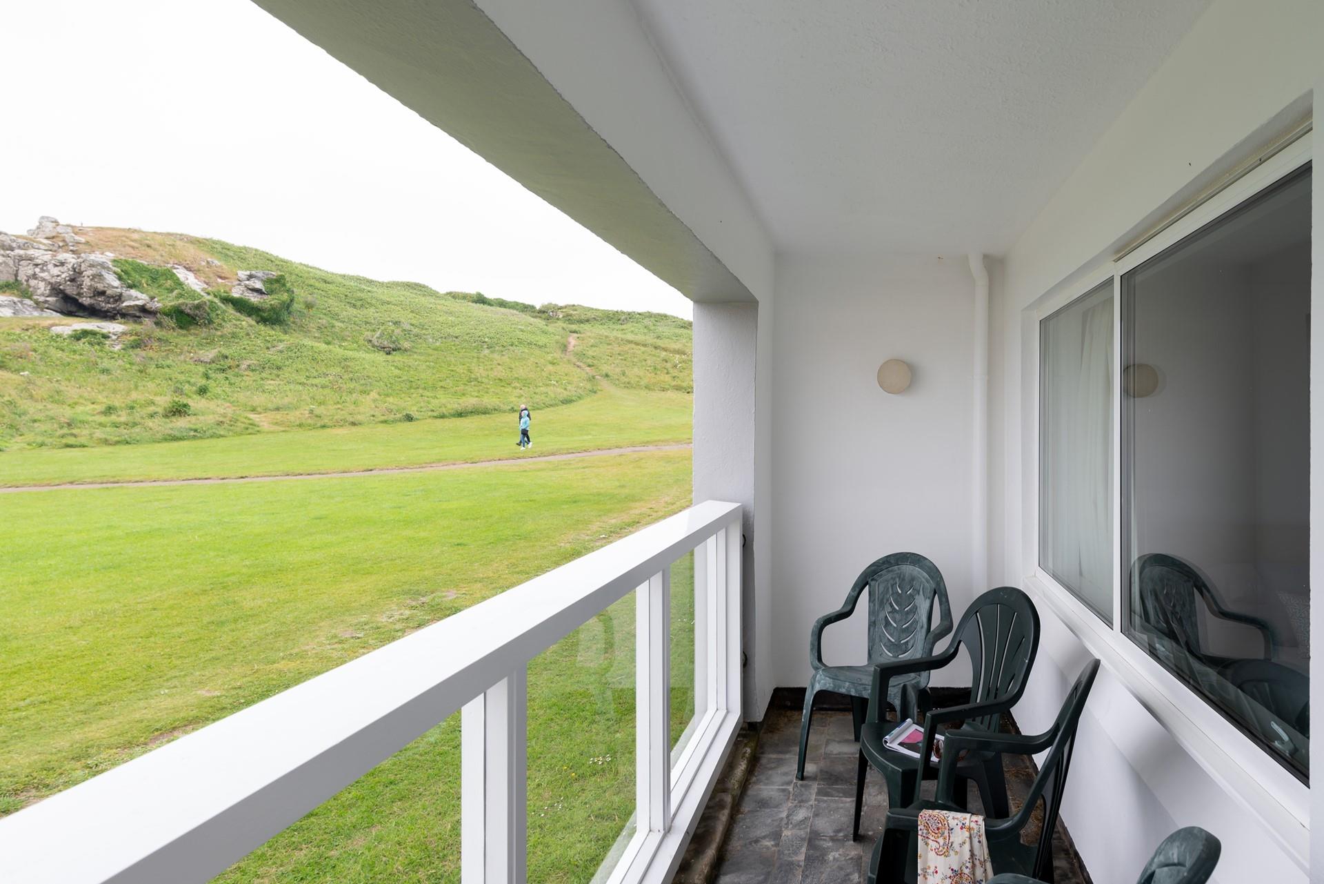 Watch the world go by on the balcony sipping your morning cuppa.