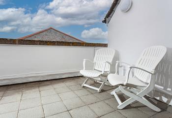 Wander out to the balcony and sip a cold G&T in the late afternoon sun.