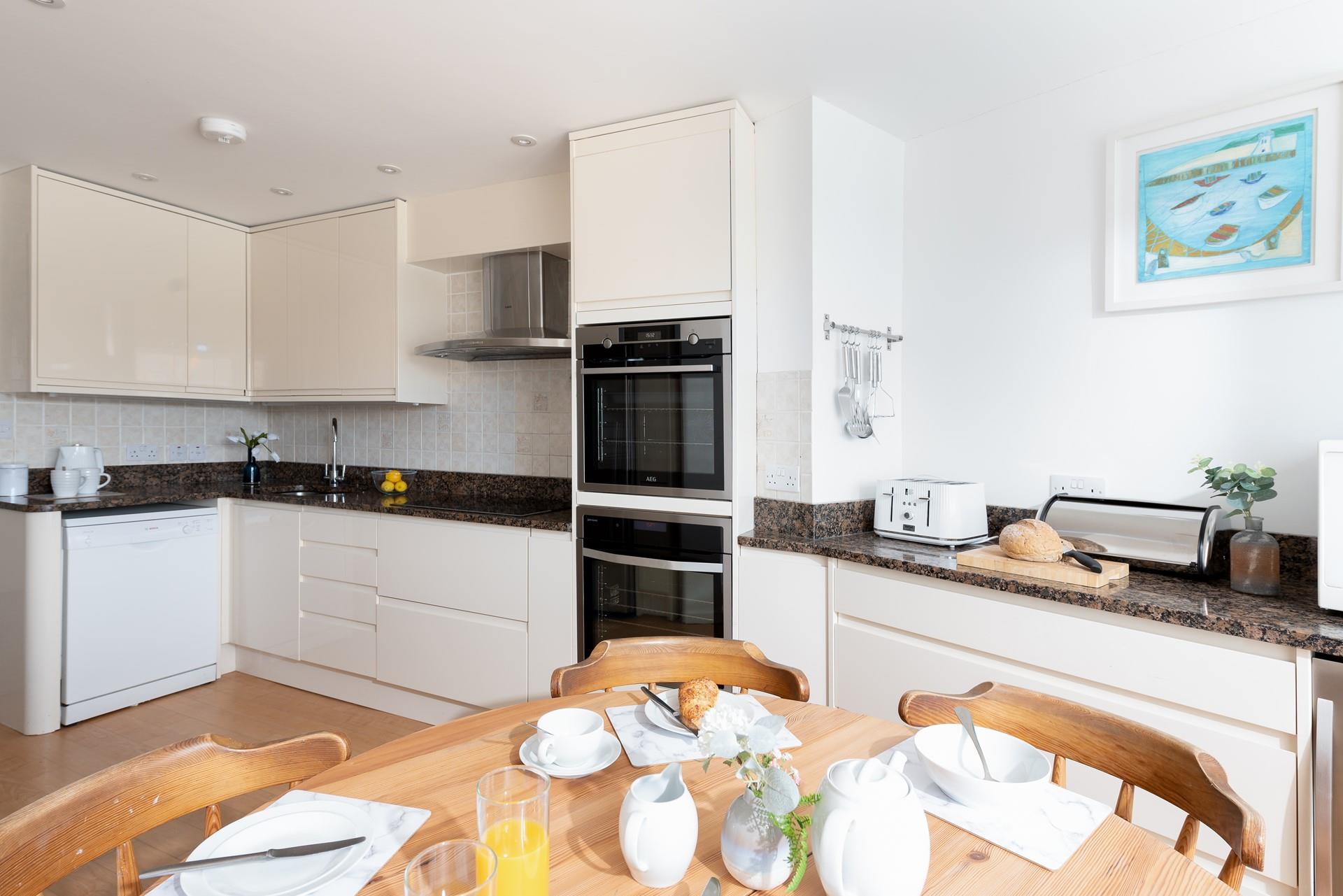 The kitchen is modern and well-equipped if you feel like cooking, or head out and explore the delightful restaurants in town!