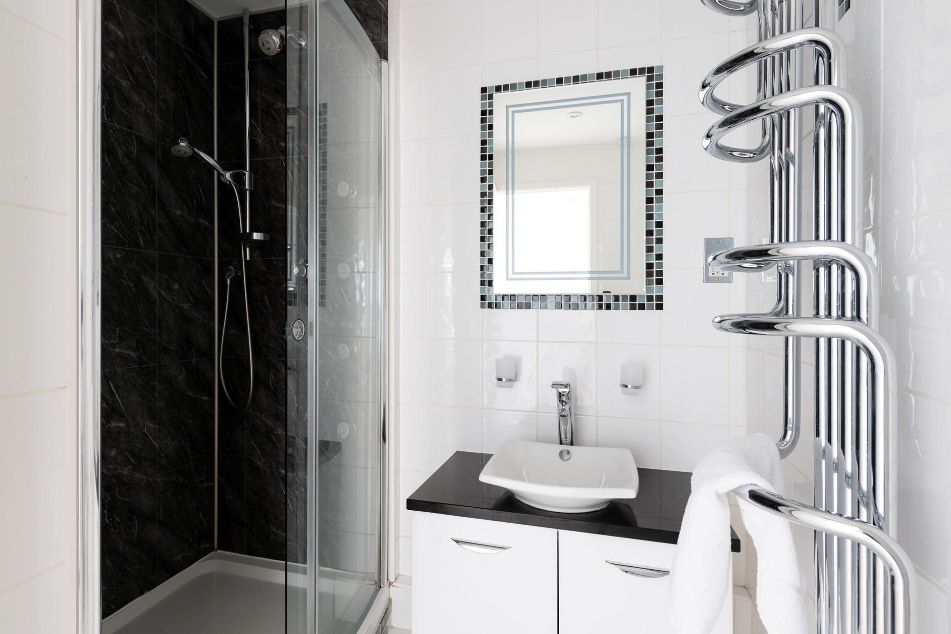 There are two bathrooms, and ample space for everyone to get ready!