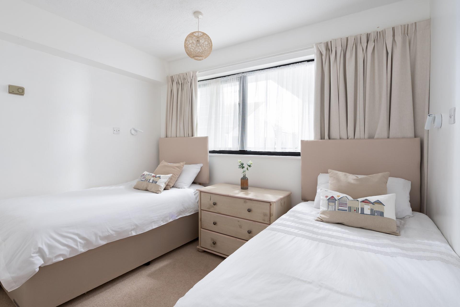 Bedroom 3 has twin beds, perfect for adults or children to cosy into.