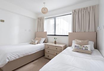 Bedroom 3 has twin beds, perfect for adults or children to cosy into.