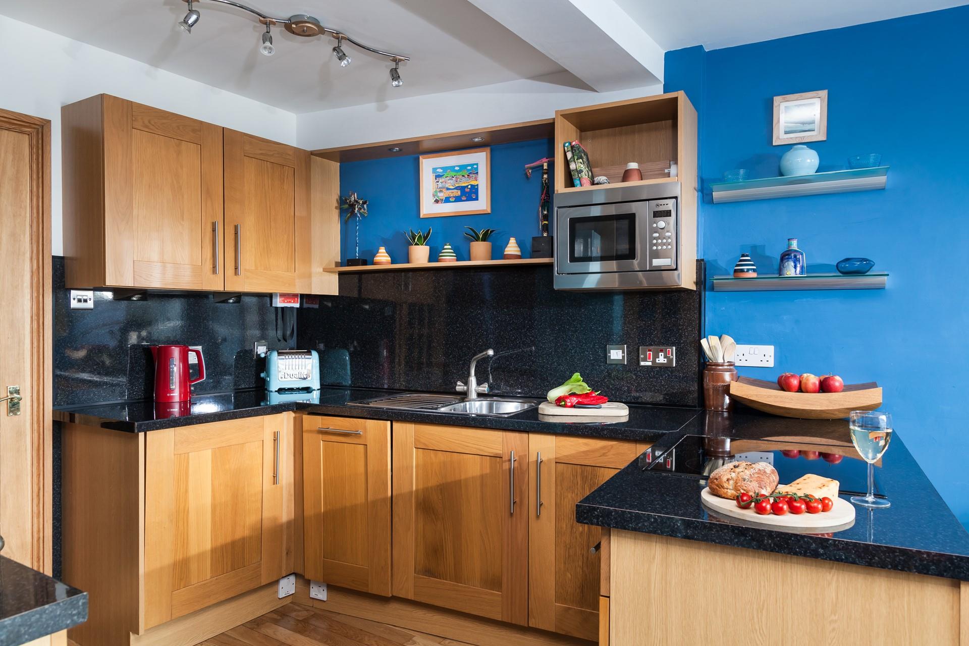 The well-equipped kitchen means the chef of the family can rustle up a tasty meal.