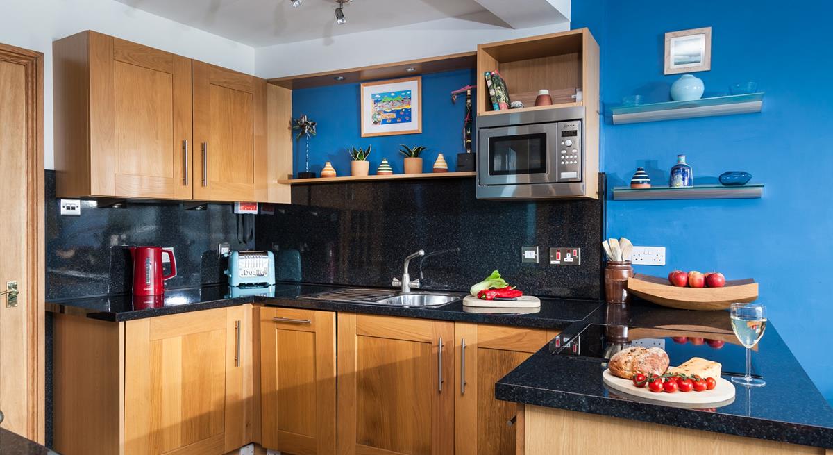 The well-equipped kitchen means the chef of the family can rustle up a tasty meal.