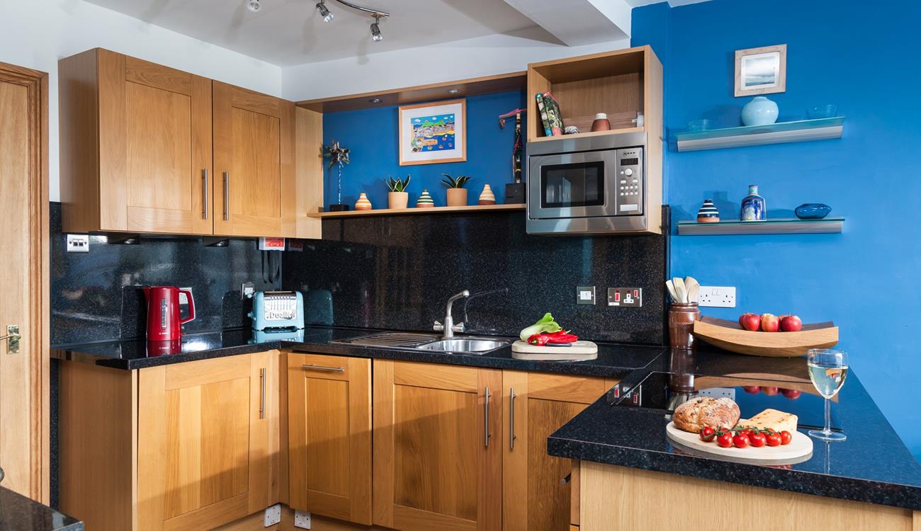 The well-equipped kitchen means the chef of the family can rustle up a tasty meal.