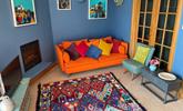 The colourful sitting room is a bright and welcoming space. - Thumbnail Image