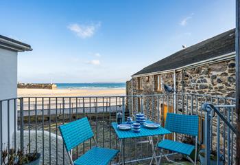 Enjoy afternoon tea in the sunshine with enviable views of St Ives.