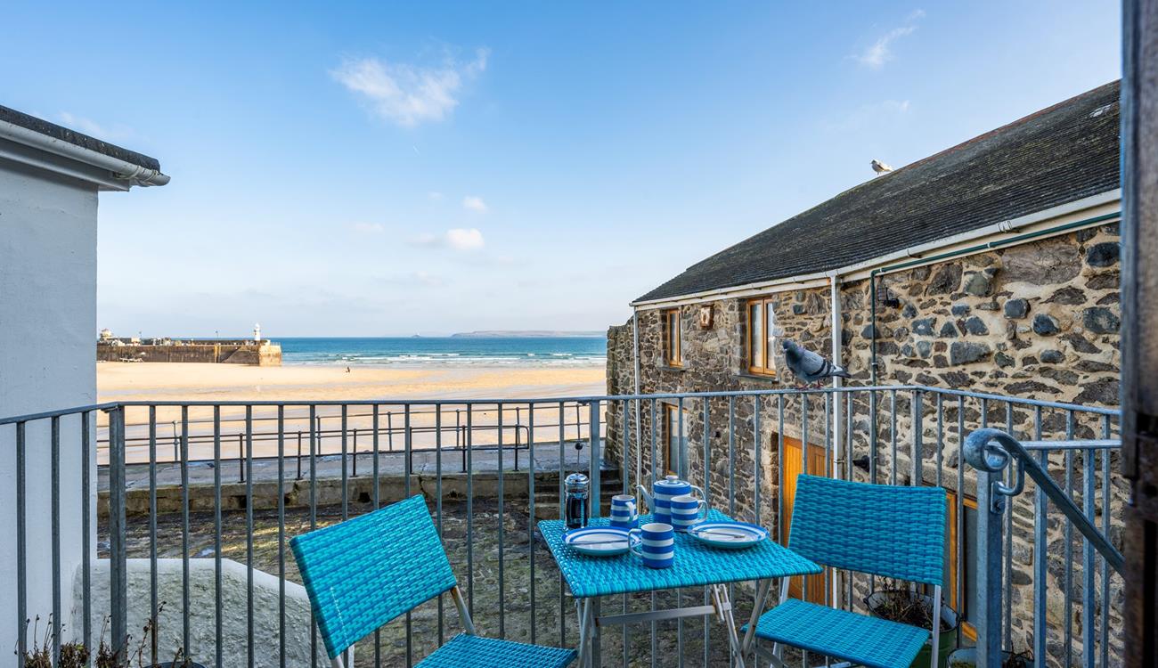 Enjoy afternoon tea in the sunshine with enviable views of St Ives.