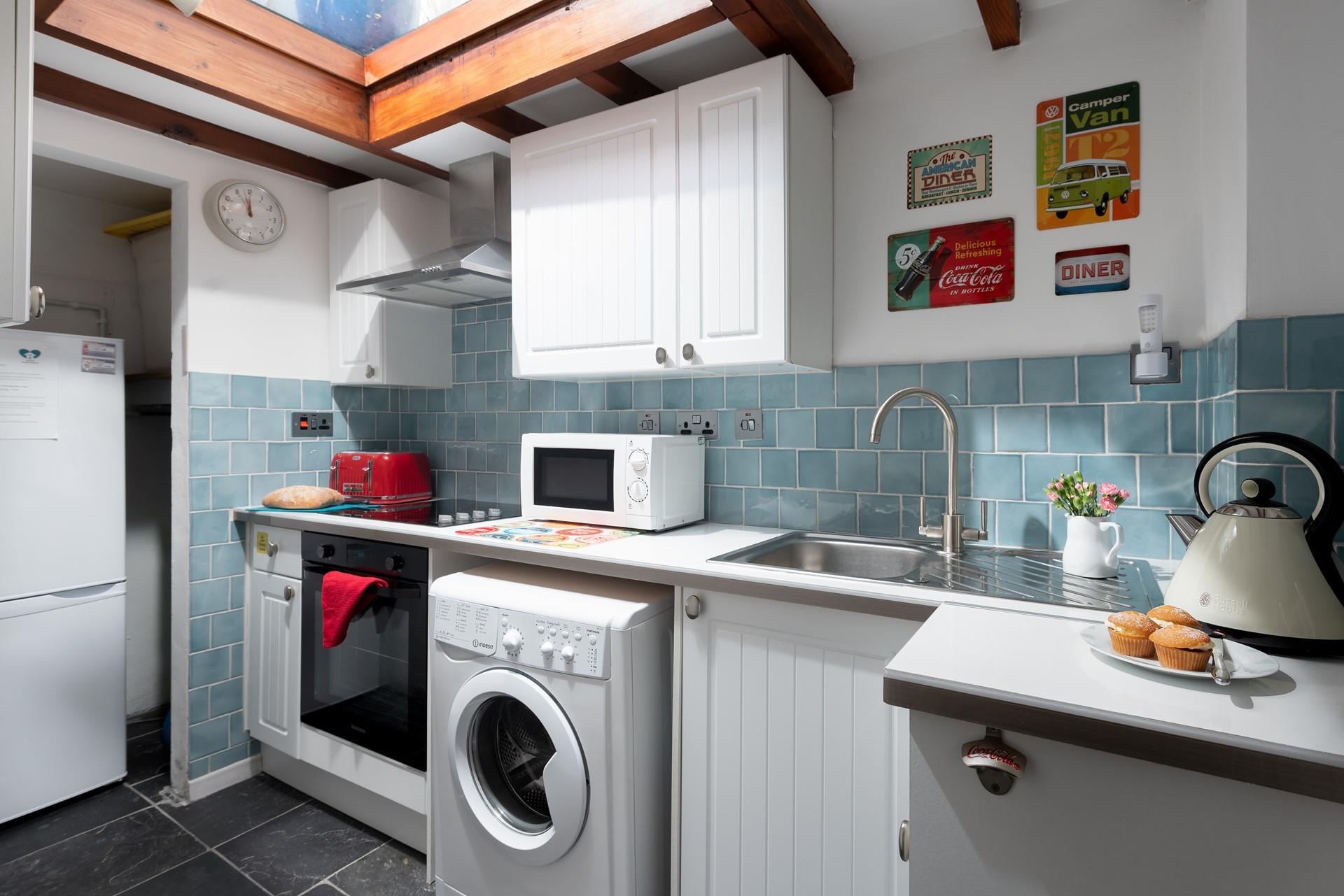 Rustle up your favourite meal in the well-equipped kitchen.