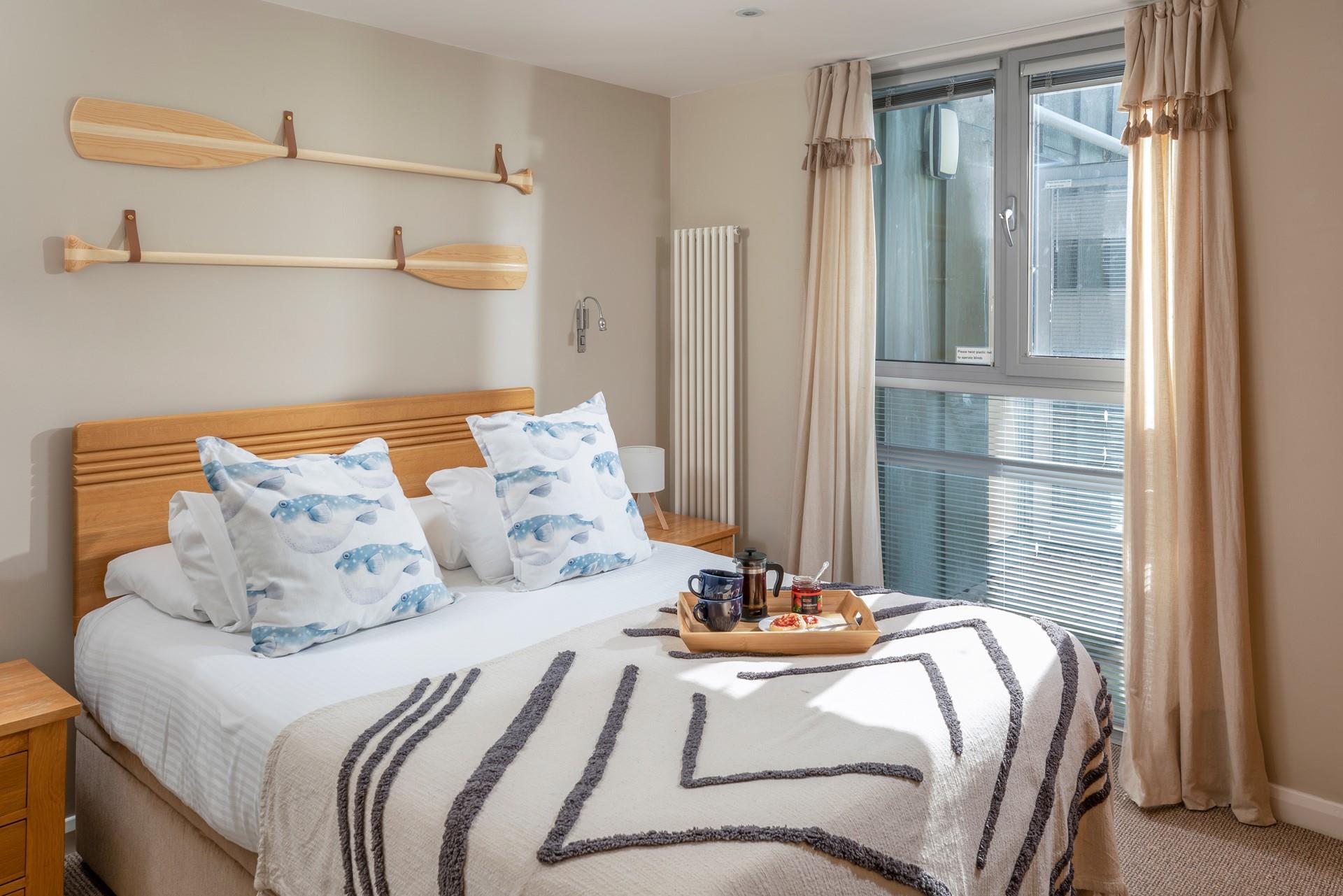 Bedroom two is next to the master bedroom with the family bathroom just across the hall.