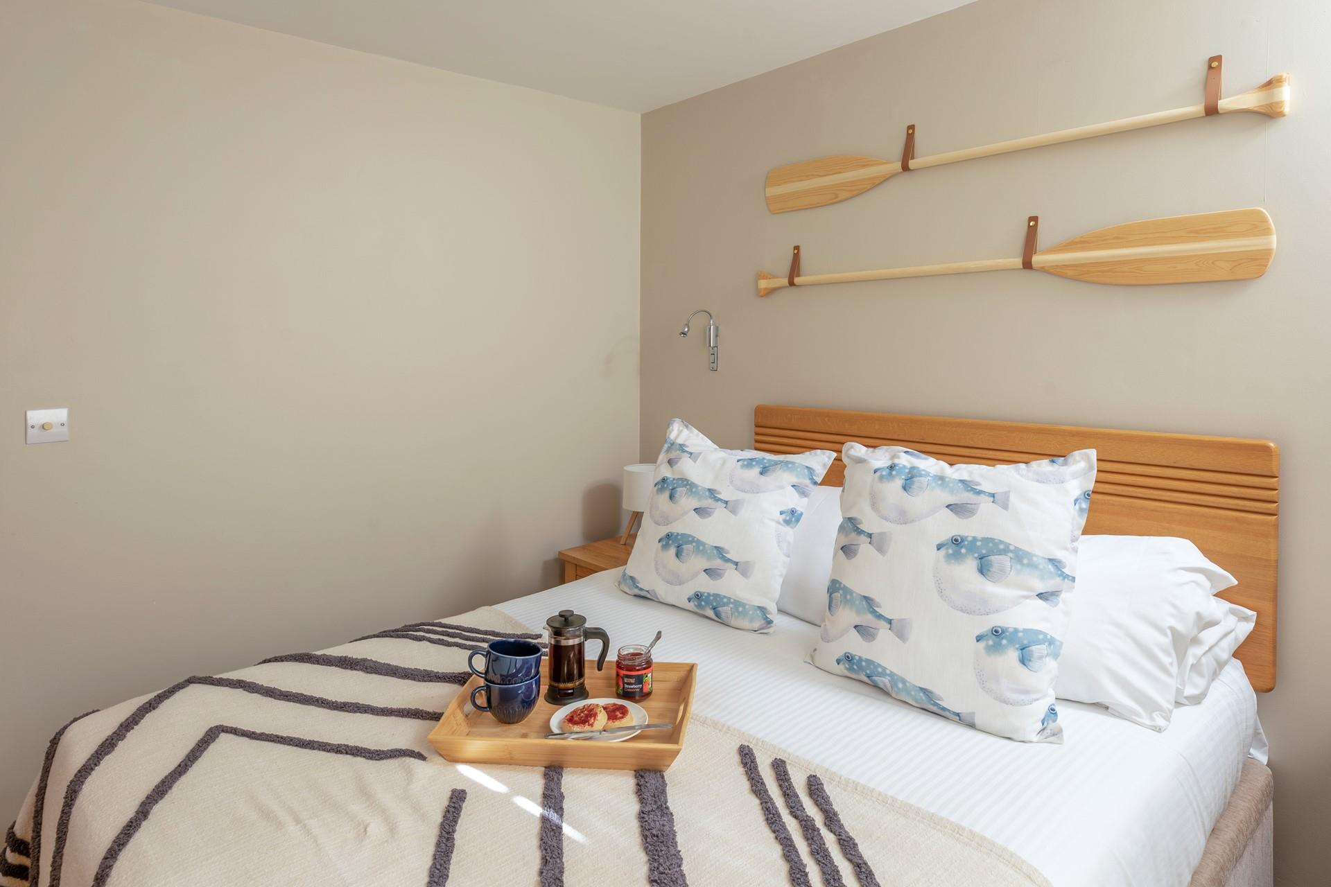 The bedroom is decorated with a seaside theme!