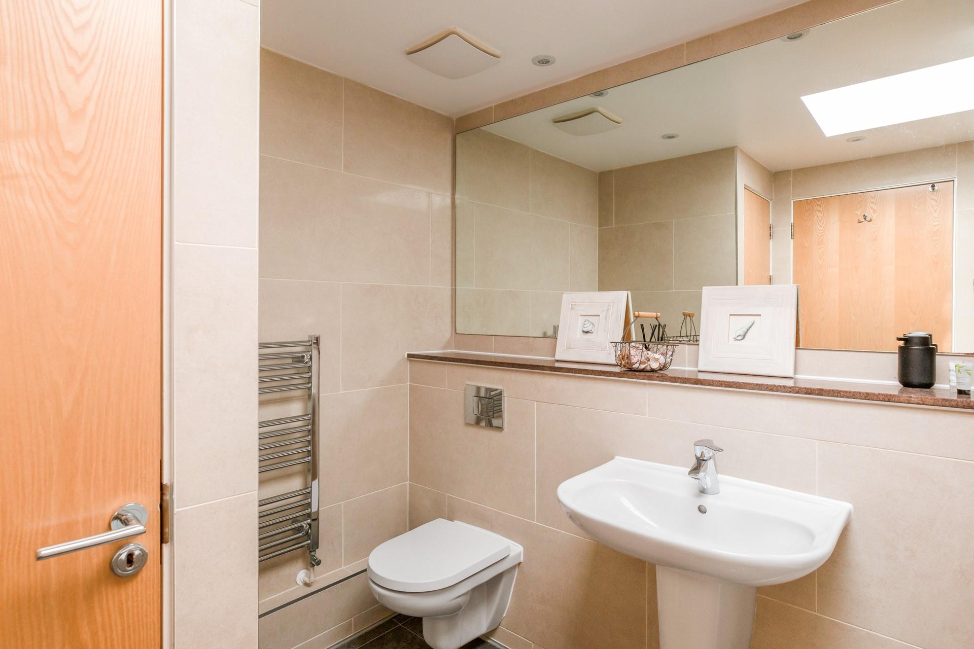 The family bathroom is ideal for getting ready in the morning.