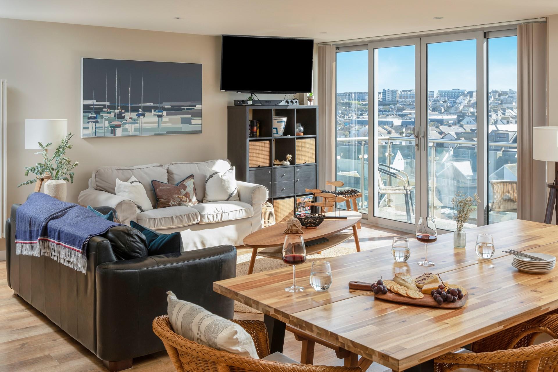 Kick back and relax with a drink in hand, as you gaze out the windows at the view beyond.