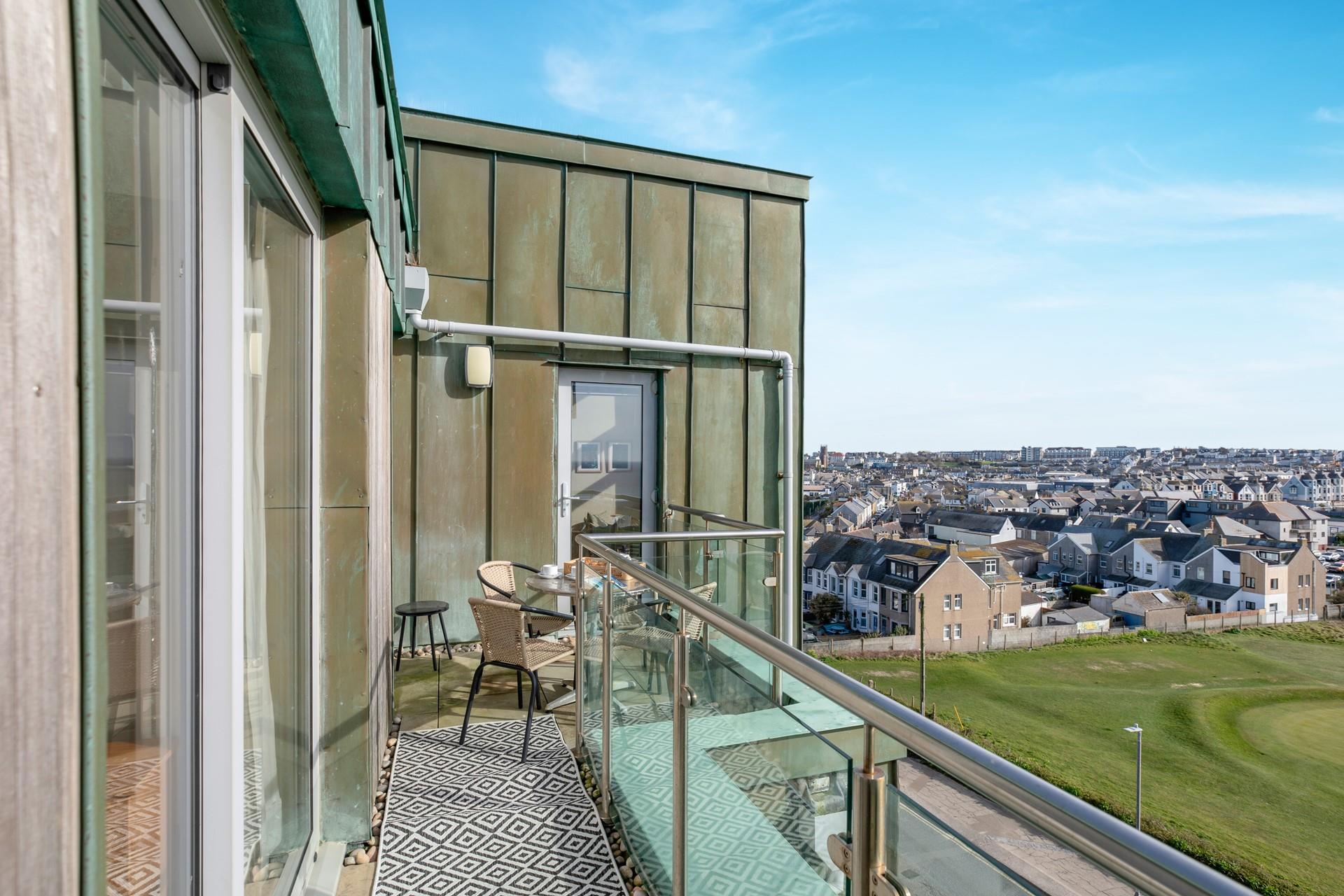 You can step out onto the balcony from both of the front bedrooms, so you can wake to the fresh sea air to start your day.