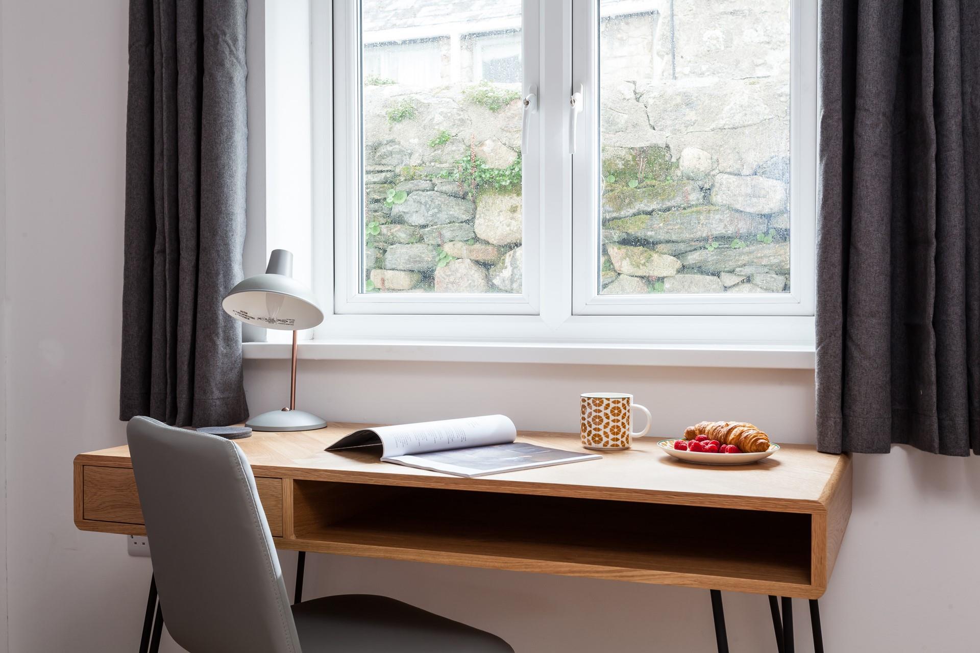 Enjoy some late night reading at your modern desk.