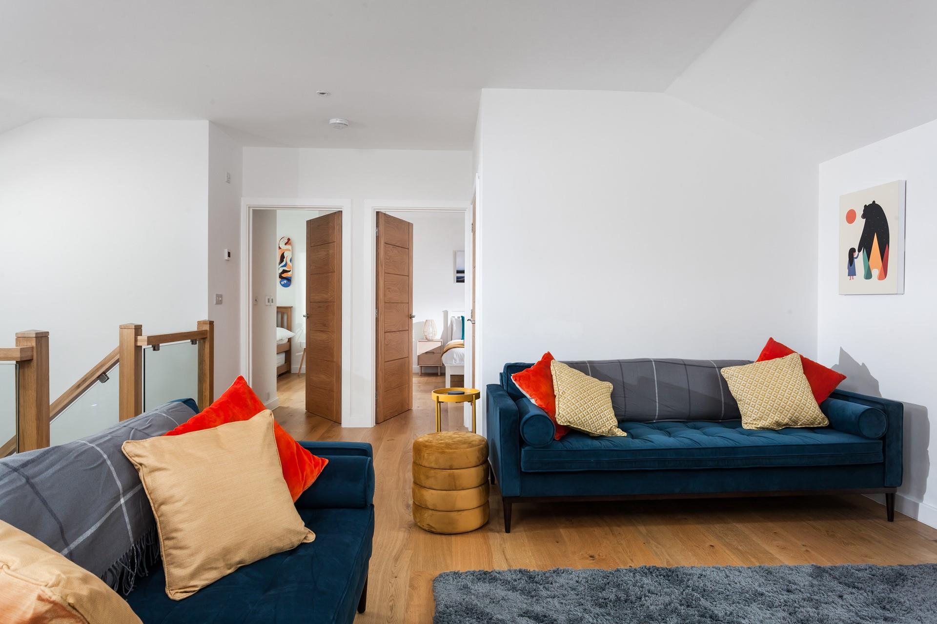 The sitting room offers you a space to snuggle down for a cosy evening with its comfy interiors.