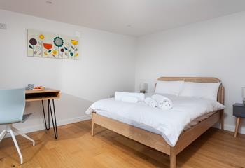 The annexe has a cosy double bed for a peaceful night's sleep.