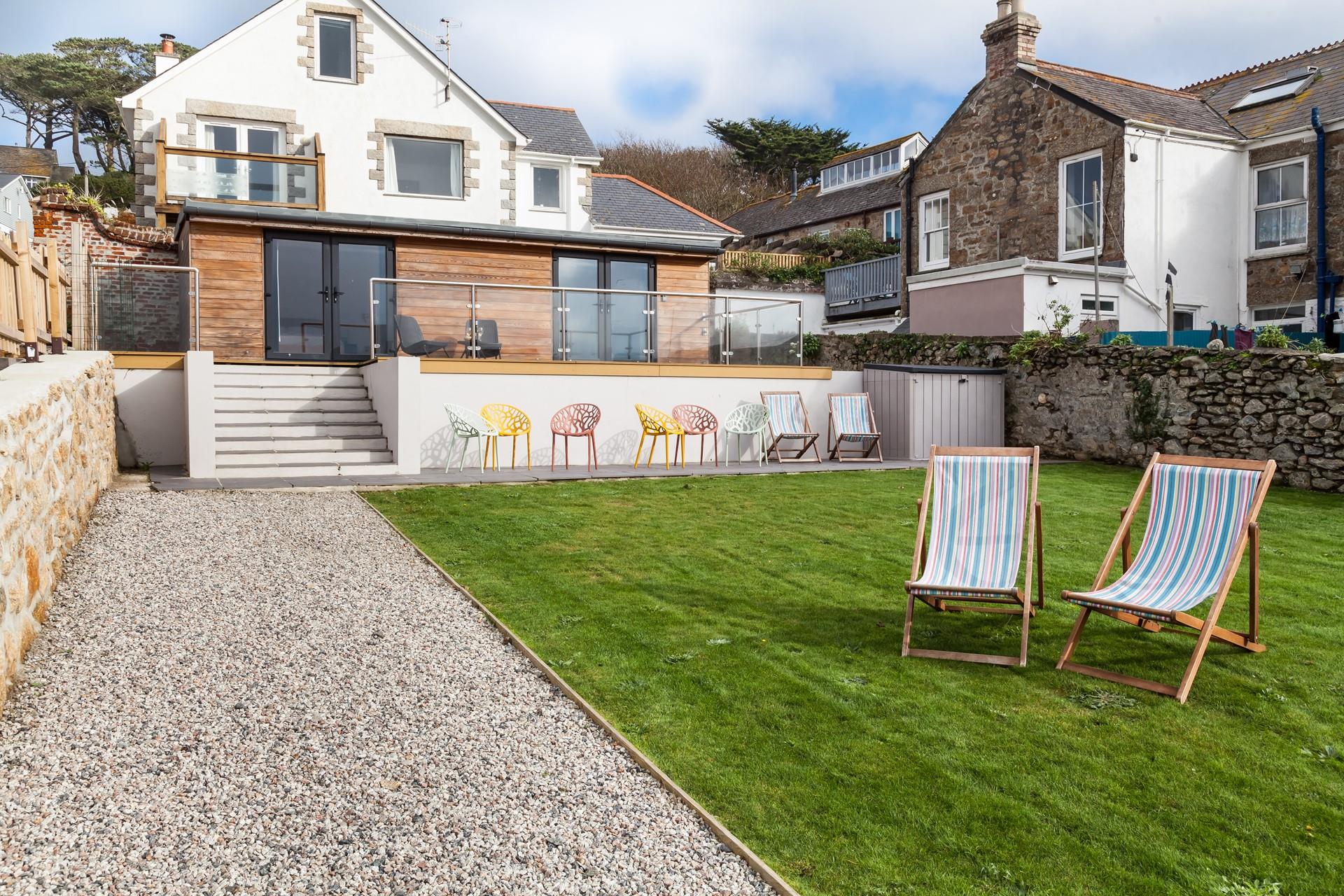 Watch the children and furry friends play in the large garden.