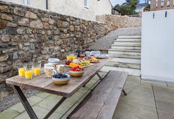 A hearty breakfast of fresh pastries can be enjoyed al fresco.