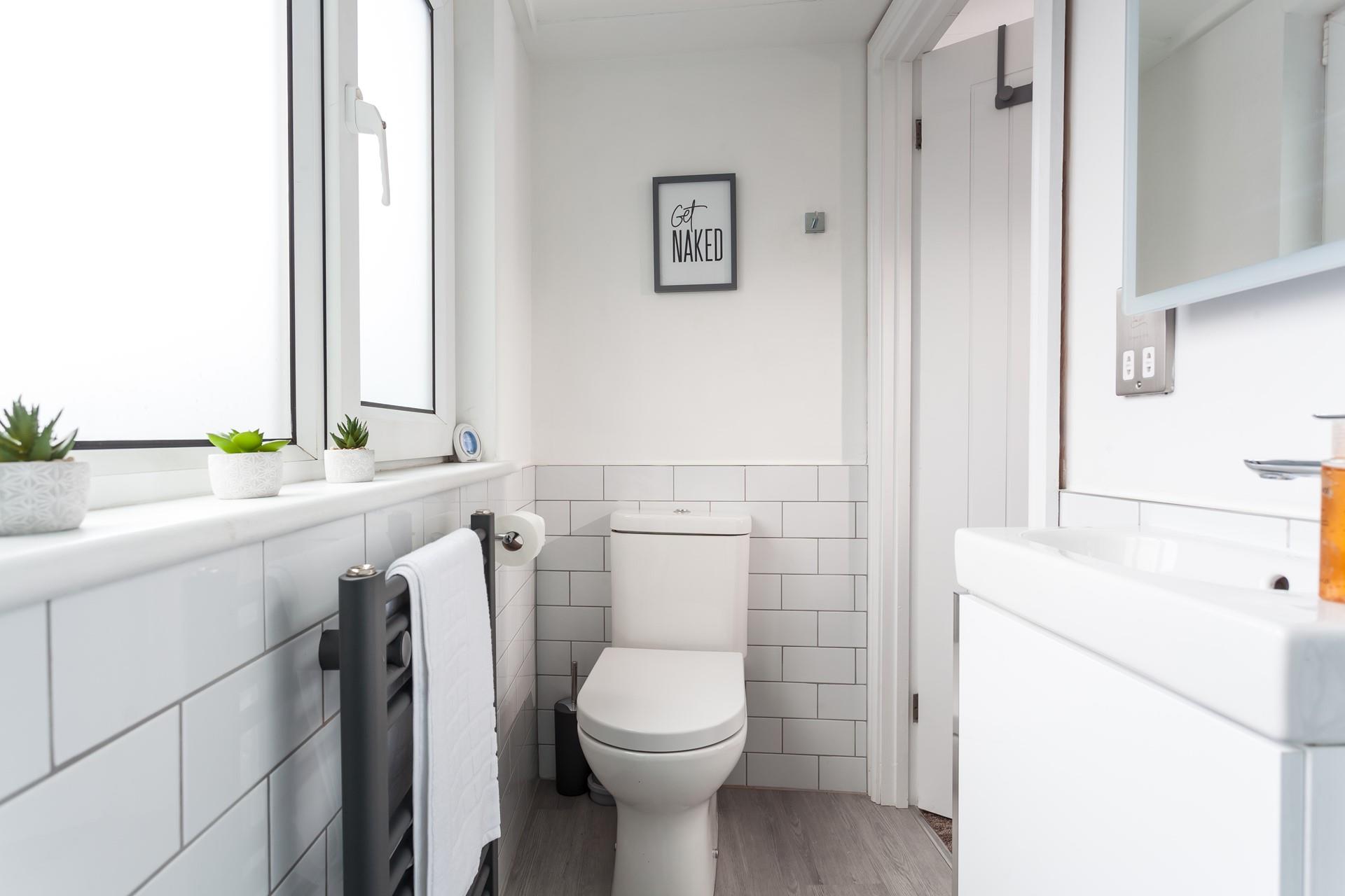 There is ample space for 6 guests, with the downstairs cloakroom featuring another basin and WC.
