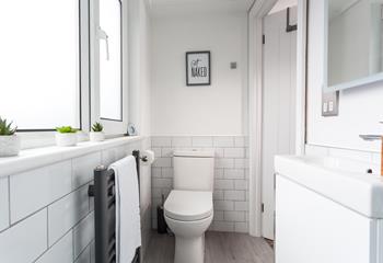 There is ample space for 6 guests, with the downstairs cloakroom featuring another basin and WC.