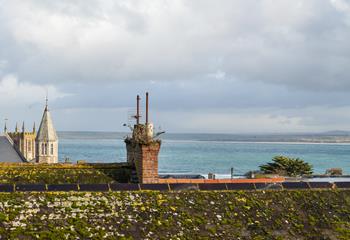 Step out your front door and wander the cobbled streets to the beach.