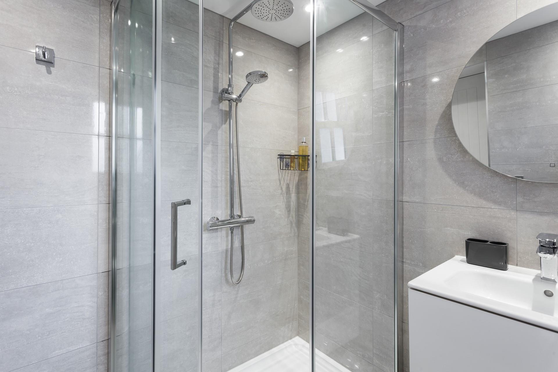 Watch off your sandy toes in the rainfall shower after a day on the beach.