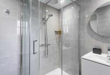 Watch off your sandy toes in the rainfall shower after a day on the beach.