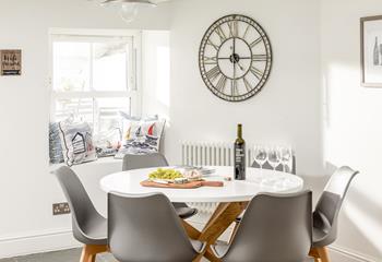 Sit around the dining table with your favourite meal in front of you.