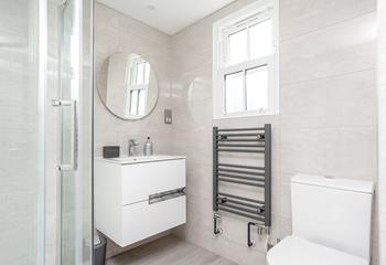 The modern and stylish bathroom is a great space to get ready in the morning.