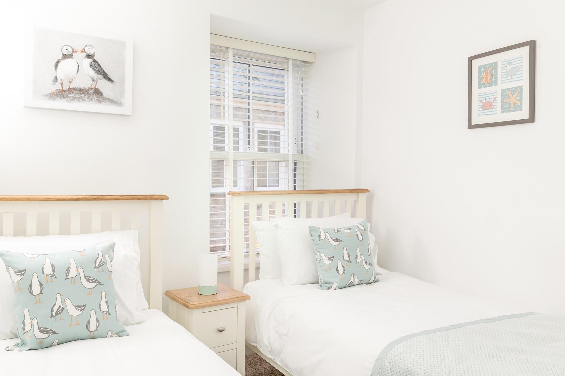 Bedroom 2 has twin beds, perfect for the little ones.